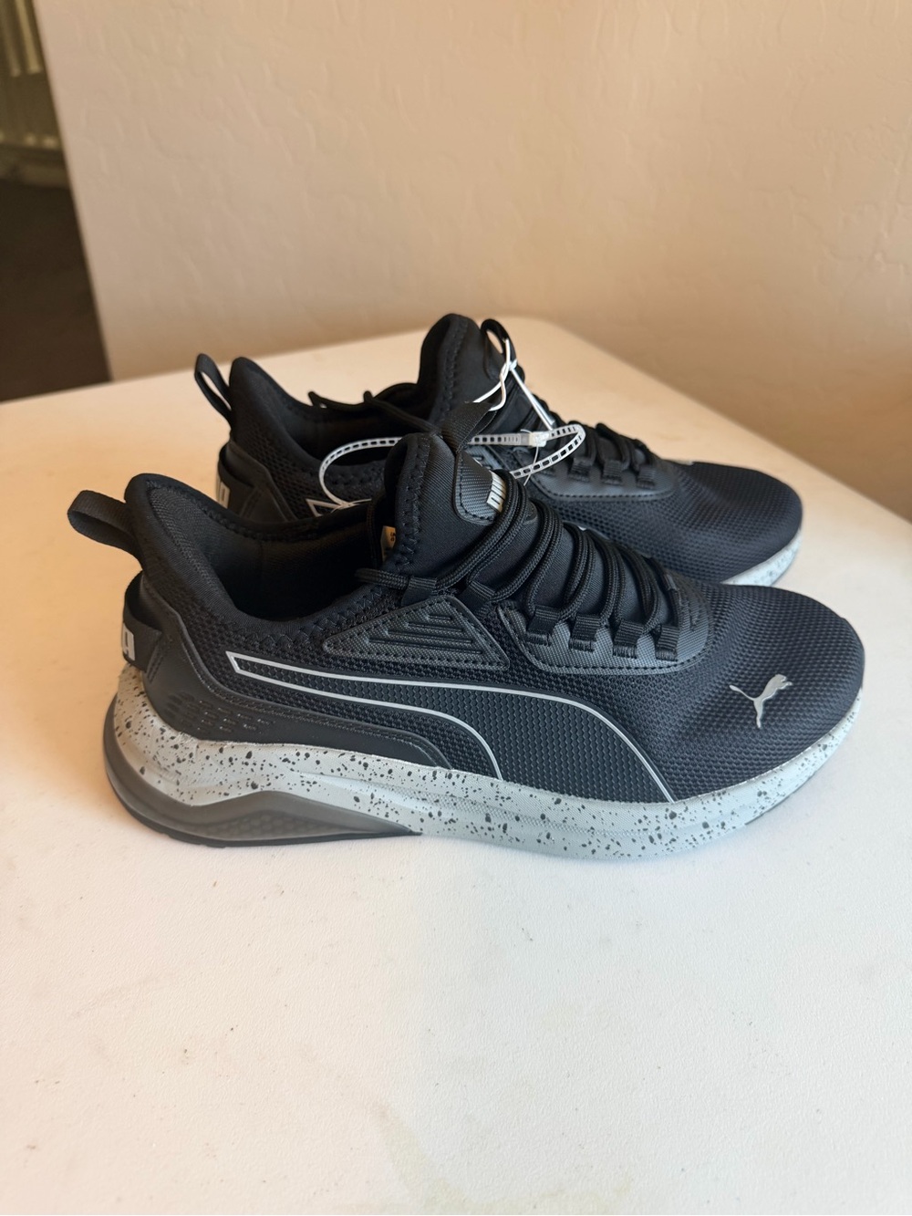 Puma Black Athletic Sneakers with Speckled White-Grey Sole
